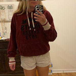 Maroon and cream Roots Canada hoodie